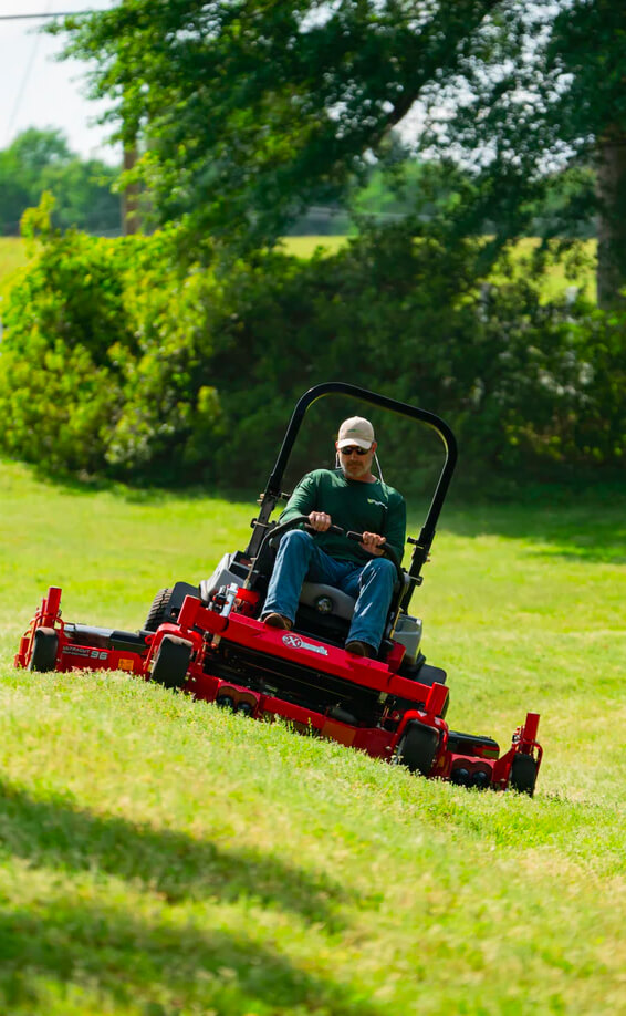 Man using commercial mower